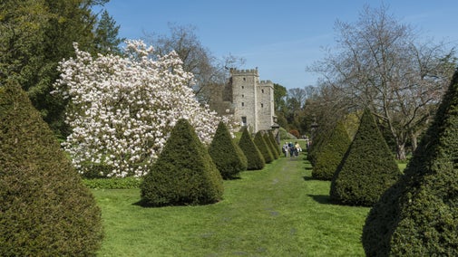 View from the topiary yew trees beyond the south lawn at Sizergh Castle, Cumbria